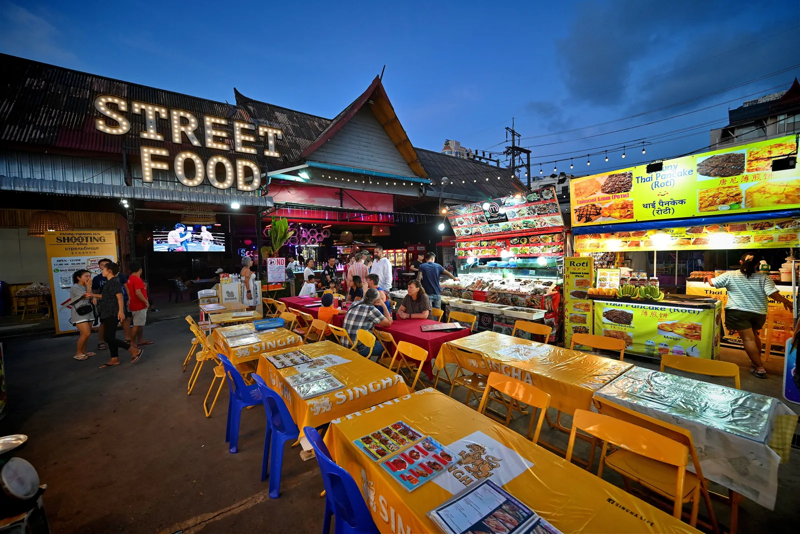 Best street food phuket cooked over charcoal at a night market stall in Phuket Old Town
