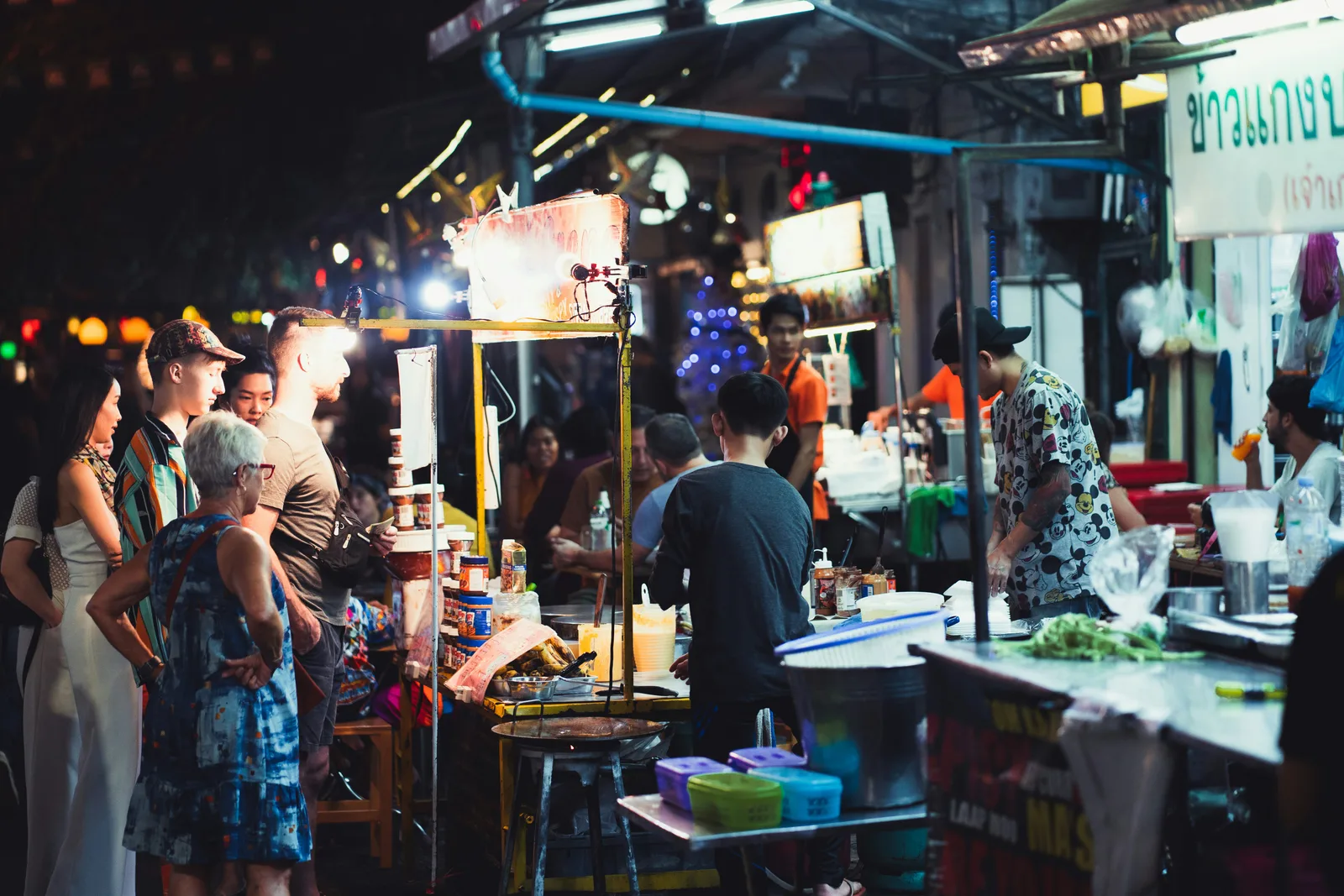 Phuket night market food stalls lit up after dark at a Phuket Town weekend market