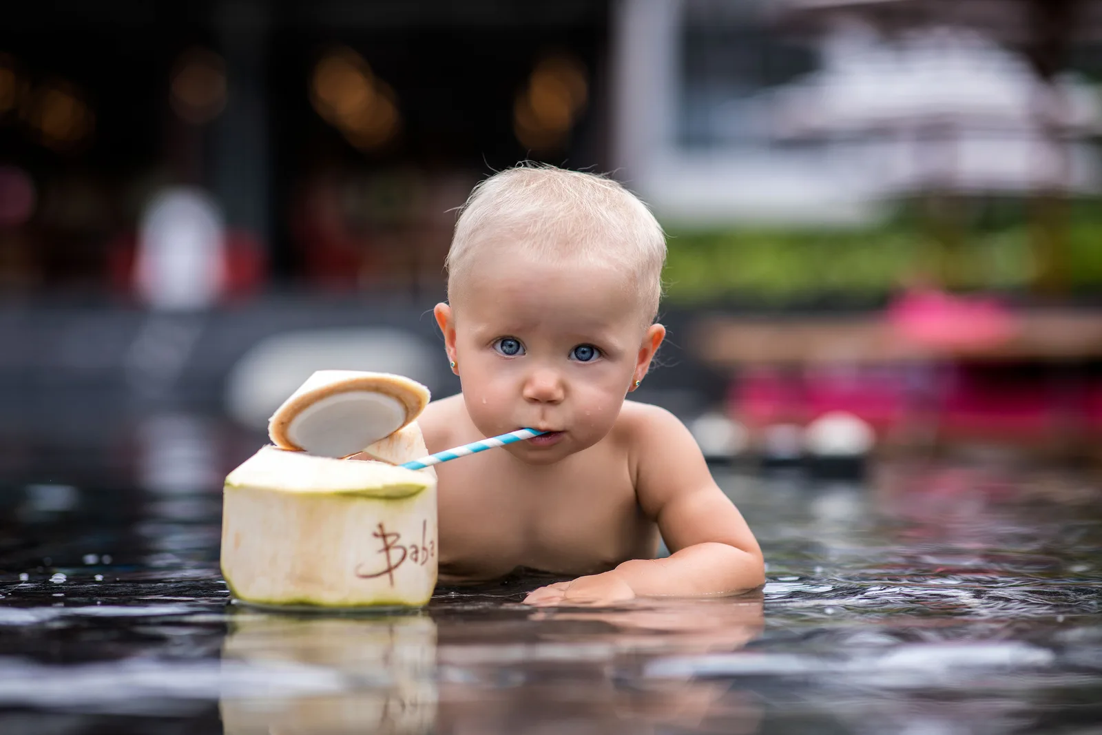 Family activities in Phuket: a calm west-coast beach with children paddling