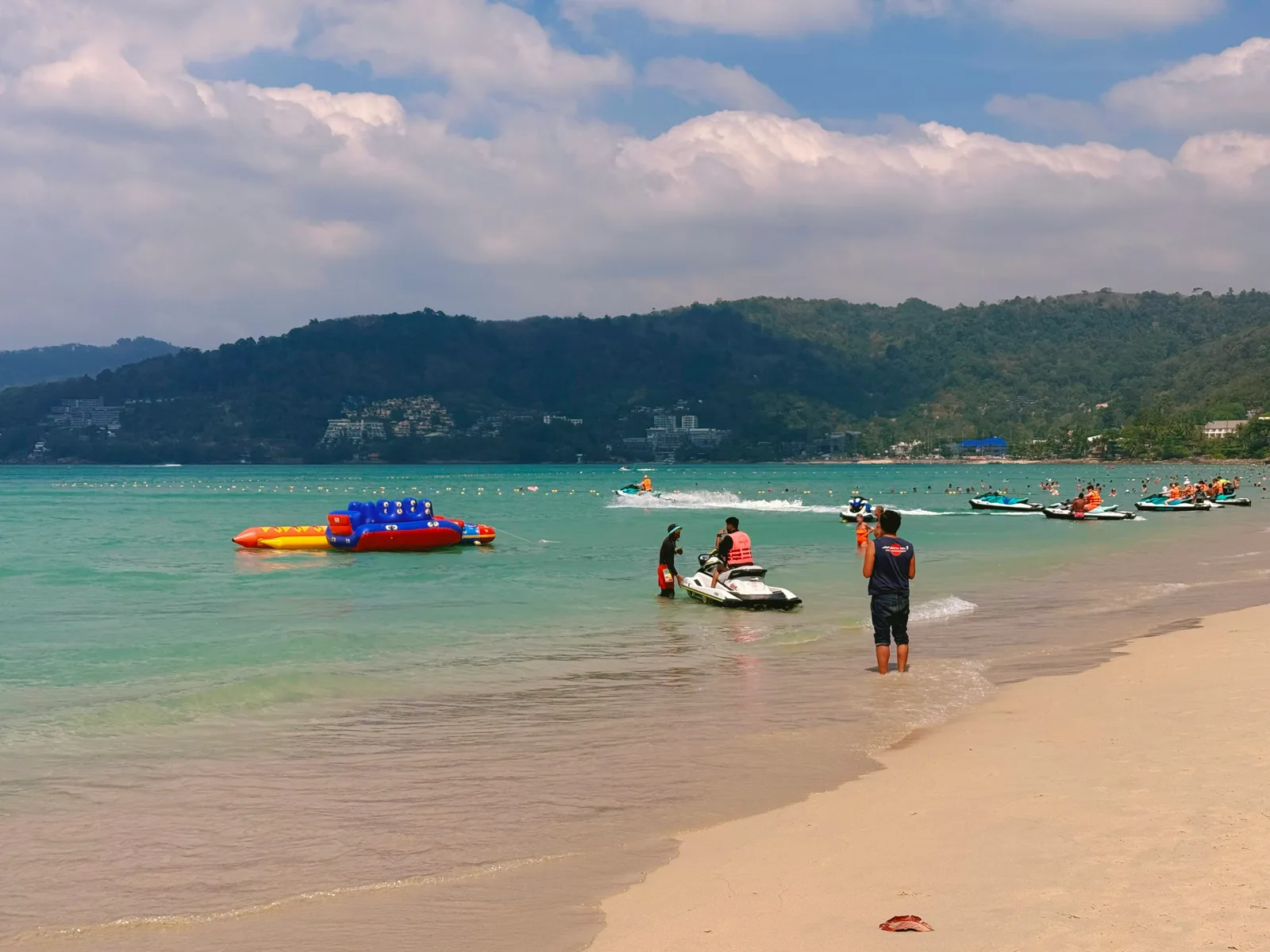 Jet ski rental counter on a Phuket beach showing honest board prices