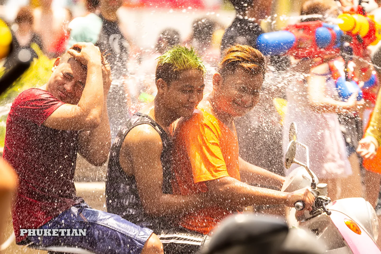 Songkran Phuket water festival: revellers soaking each other with water guns on Bangla Road, Patong