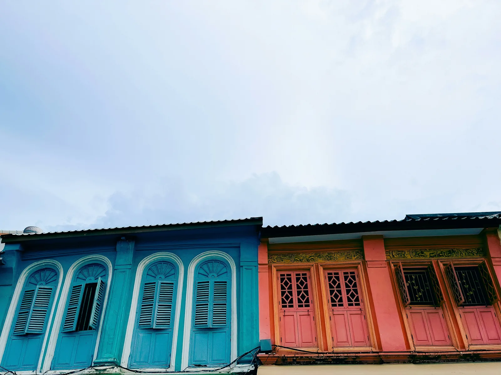 Sino-Portuguese shophouse street in Phuket Old Town, a budget first-time base